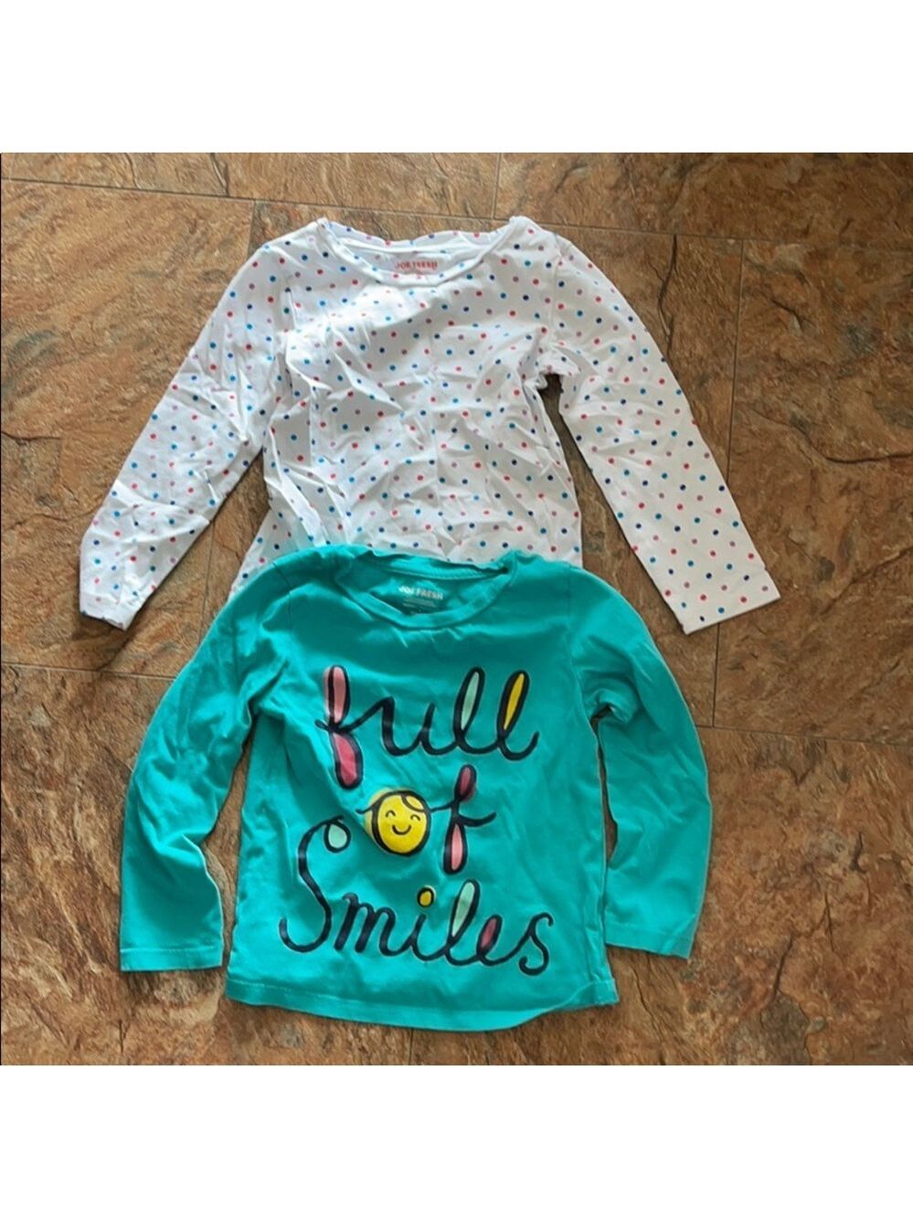 Bundle of 2 long sleeve shirts size 4.